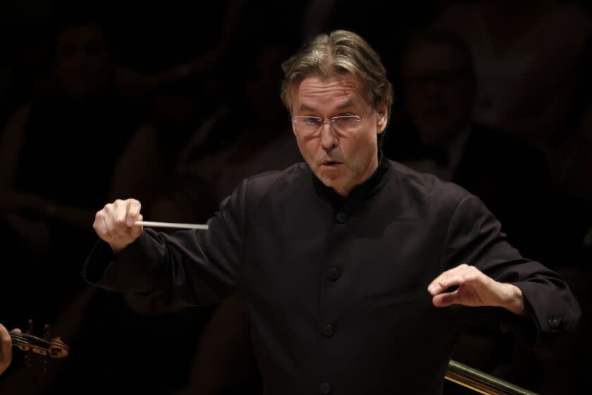 LOS ANGELES, CA OCTOBER 24, 2019: Esa-Pekka Salonen conducting at Walt Disney Concert Hall. On its 100th birthday, the LA Phil holds a gala concert at the Walt Disney Concert Hall October 24, 2019. The event includes its three living music directors -- Zubin Mehta, Esa-Pekka Salonen and Gustavo Dudamel -- performing the premiere of Icelandic composer Daniel Bjarnason's "From Space I saw Earth," for three conductors, written for the occasion. (Francine Orr/ Los Angeles Times)