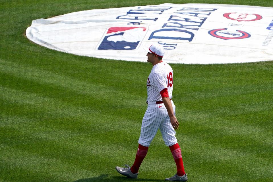 Cincinnati Reds first baseman Joey Votto walks on the field before a team picture Thursday at the MLB Field of Dreams stadium in Dyersville.