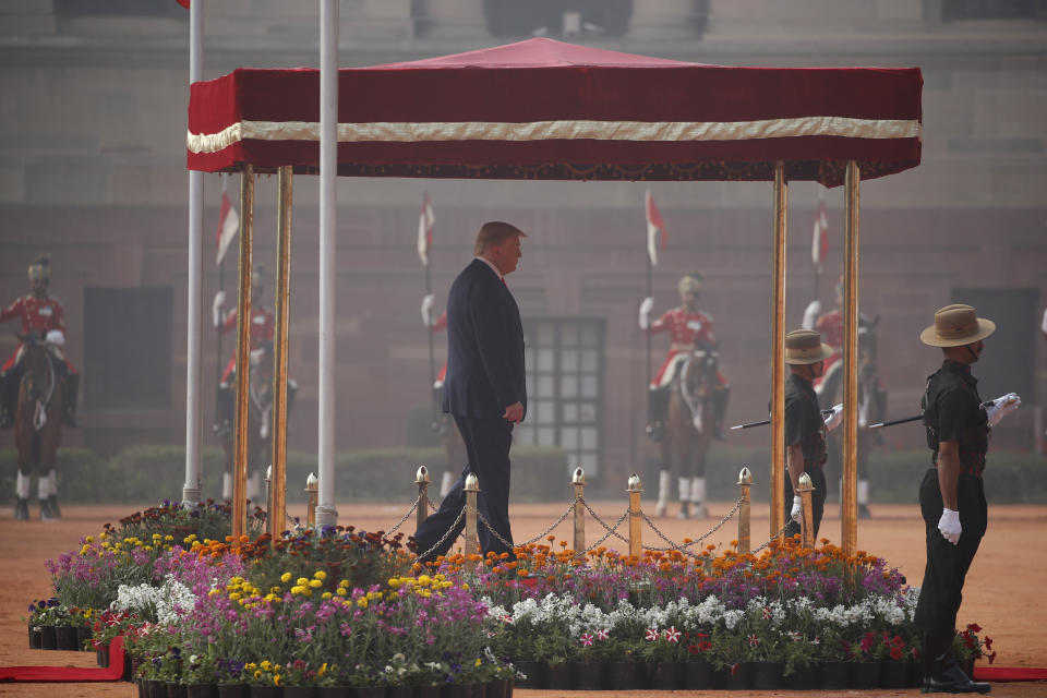 U.S. President Donald Trump receives a ceremonial welcome at Rashtrapati Bhavan, the presidential palace, in New Delhi, India, Tuesday, Feb. 25, 2020. (AP Photo/Alex Brandon)