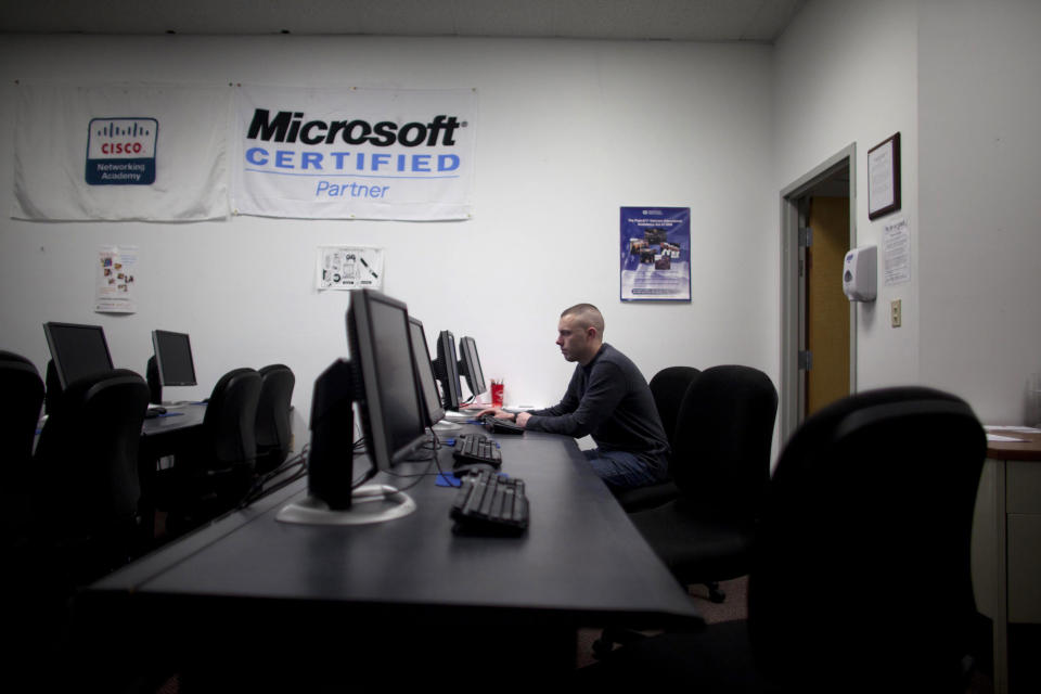 U.S. Marine Sergeant Michael Kidd works on a computer at ECPI University in Virginia Beach, Virginia, February 7, 2012. (Photo: REUTERS/Samantha Sais)