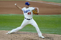 Los Angeles Dodgers relief pitcher Blake Treinen throws against the Atlanta Braves during the seventh inning in Game 6 of a baseball National League Championship Series Saturday, Oct. 17, 2020, in Arlington, Texas. (AP Photo/Tony Gutierrez)