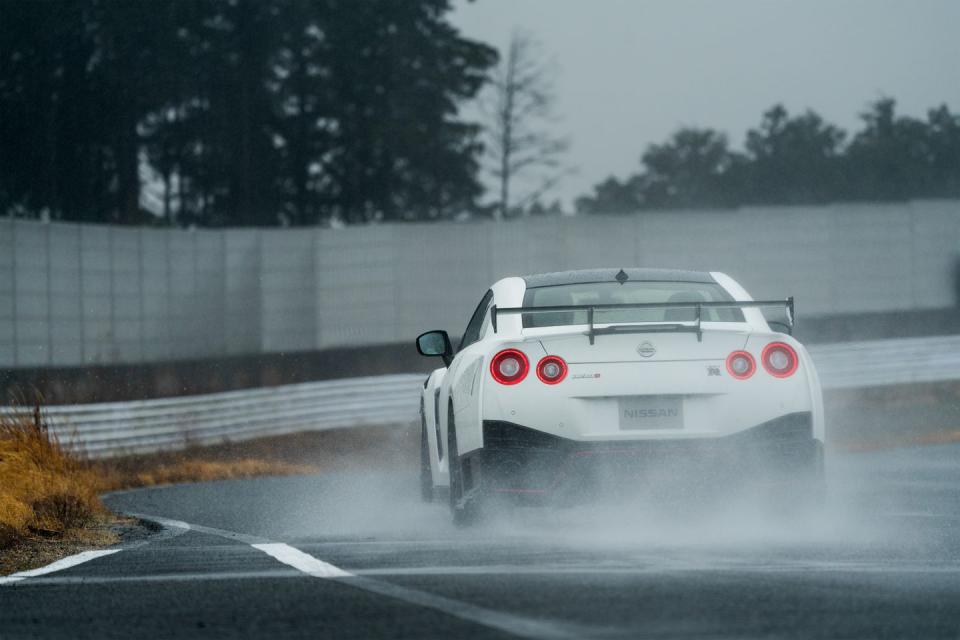<p>Nissan says the automated gearbox will downshift more aggressively in this setting and better adapt to the driver, reducing the need to manually switch between the more subdued A drive mode. The GT-R's chassis is enhanced with a re-tuned suspension that should ride smoother and corner better. Likewise, the steering and braking systems have been optimized to be more responsive.</p>