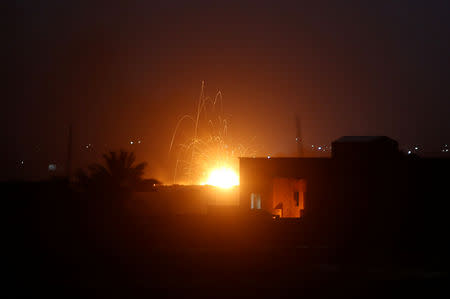 Fire is seen during fighting in the Islamic State's final enclave, in the village of Baghouz, Deir Al Zor province, Syria March 17, 2019. REUTERS/Stringer