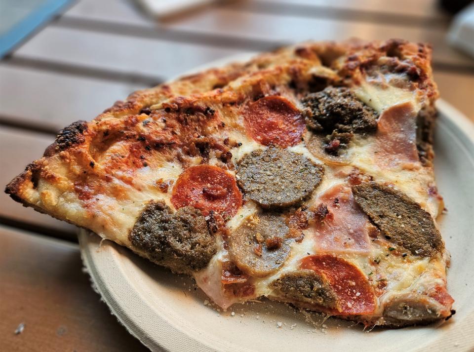 The Loaded Barrel in Bradenton makes a Butcher's Bounty (mozzarella, pepperoni, bacon, ham, sausage, meatball) specialty pizza, which was being sold by the slice the week of Jan. 5, 2024.