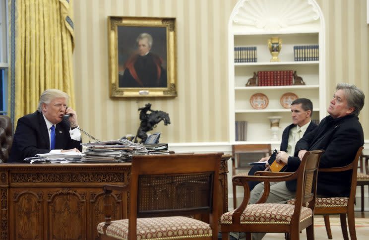 President Trump calls Australian Prime Minister Malcolm Turnbull on Jan. 28 as Michael Flynn, then-national security adviser, and chief strategist Steve Bannon look on. (Photo: Alex Brandon/AP)