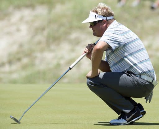 Carl Pettersson of Sweden lines up a putt during round one of the 94th PGA Championship, on August 9, on Kiawah Island, South Carolina. Pettersson, who had never broken 70 before in the PGA Championship, birdied three of his first four holes to take a one-shot lead after the first round