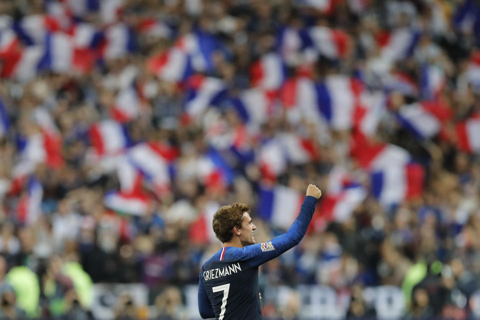 France's Antoine Griezmann celebrates scoring his side's 2nd goal during a UEFA Nations League soccer match between France and Germany at Stade de France stadium in Saint Denis, north of Paris, Tuesday, Oct. 16, 2018. (AP Photo/Christophe Ena)