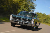 <p>Production commenced in September 1963, and while the original sales forecast was <strong>5000</strong> units for the first year, the result was<strong> 32,450</strong>. The GTO package was available as an option for the Pontiac LeMans and was offered in coupe, convertible and hardtop bodies. The package beefed up the engine, which meant <strong>325bhp</strong>, alongside various other components and GTO badging.</p><p>It was simply cool in the 1960s, and despite the slow steering and questionable brakes, it had plenty of twist. The 1965 Tempest guise covered the quarter mile in under <strong>15sec</strong>.</p>