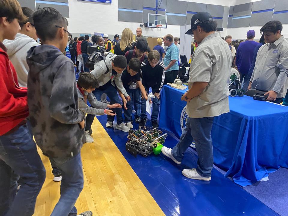Moody High School students showed off the school's robotics program to Adkins Middle School students Wednesday at CCISD's CTE Pathways to Your Future Expo at Carroll High School.