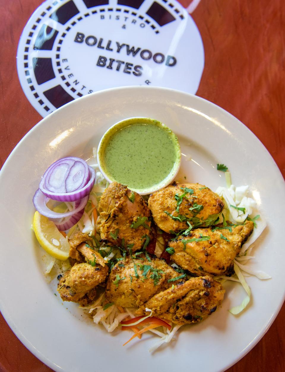Malang Malai Chicken Tikka – pieces of chicken marinated in yogurt, cashew paste and aromatic spices – at the new Indian restaurant Bollywood Bites in downtown Peoria.
