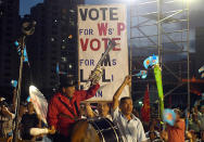 This man is a mainstay at every Workers' Party rally. (Yahoo! photo)