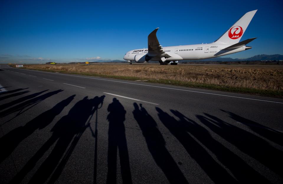 A Japan Airlines Boeing 787-800 Dreamliner taxis to a gate after arriving at Vancouver International Airport in Richmond, B.C., on Monday Feb. 3, 2014, marking the first time the aircraft has landed at the airport. The Boeing 787 will be used by Japan Airlines on the existing Tokyo Narita-Vancouver route once a week and will be phased into the regular daily service currently being flown by a Boeing 767 beginning March 30. (AP Photo/The Canadian Press, Darryl Dyck)