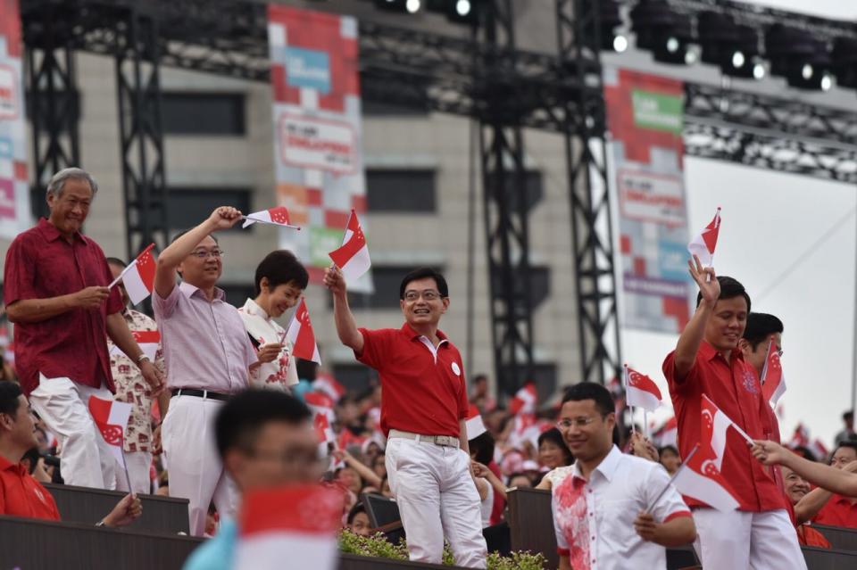 Finance Minister Heng Swee Keat (centre) at National Day Parade celebrations at The Float at Marina Bay on 9 August 2018. (Yahoo News Singapore file photo)