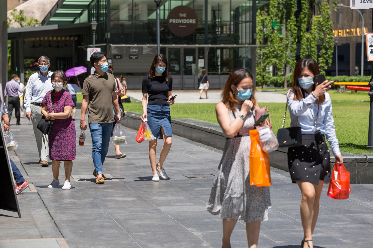 Workers seen during lunch hour in Singapore’s central business district on 2 June 2020. (PHOTO: Dhany Osman / Yahoo News Singapore)