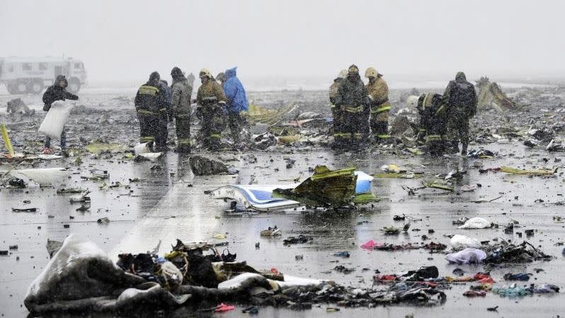 Debris littered the runway at the Russian airport. Photo: AP