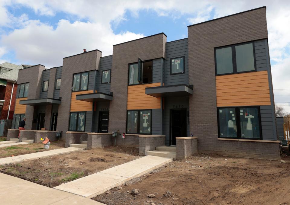 Four townhomes under construction at Pallister Gardens near Henry Ford Hospital in Detroit on Wednesday, April 26, 2023. 