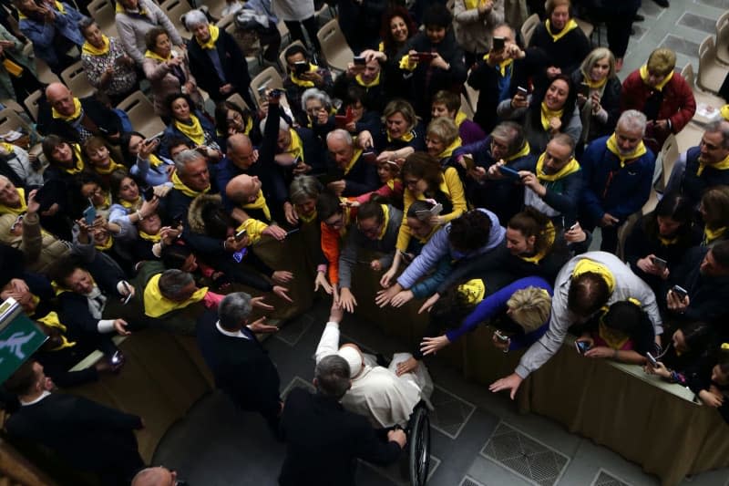 Pope Francis arrives to lead the audience with pilgrims from the Dioceses of Cesena-Sarsina, Savona and Imola in Paul VI Audience Hall at the Vatican. Evandro Inetti/ZUMA Press Wire/dpa