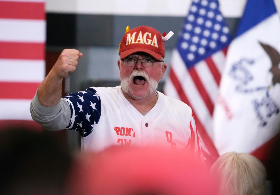 Supporters of Republican presidential candidate and former President Donald Trump gather to hear him speak during a rally, Saturday, Nov. 18, 2023, in Fort Dodge, Iowa. (AP Photo/Bryon Houlgrave)