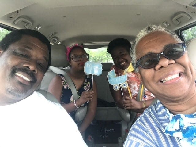 Teia Brown, (right) and her husband, Rob Brown, and their daughters,  Celidreya Brown, 21, and Cyndi Brown, 17. Teia Brown said she's worried about the safety of her daughters as they prepare to leave their home. (Photo courtesy of Teia Brown)