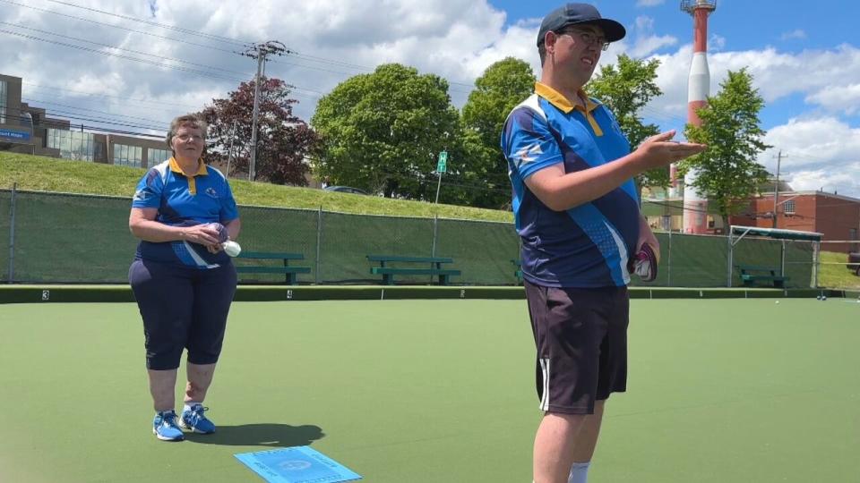 The Sitemans said they love lawn bowling because it's a sport they can player together despite their age differences. 