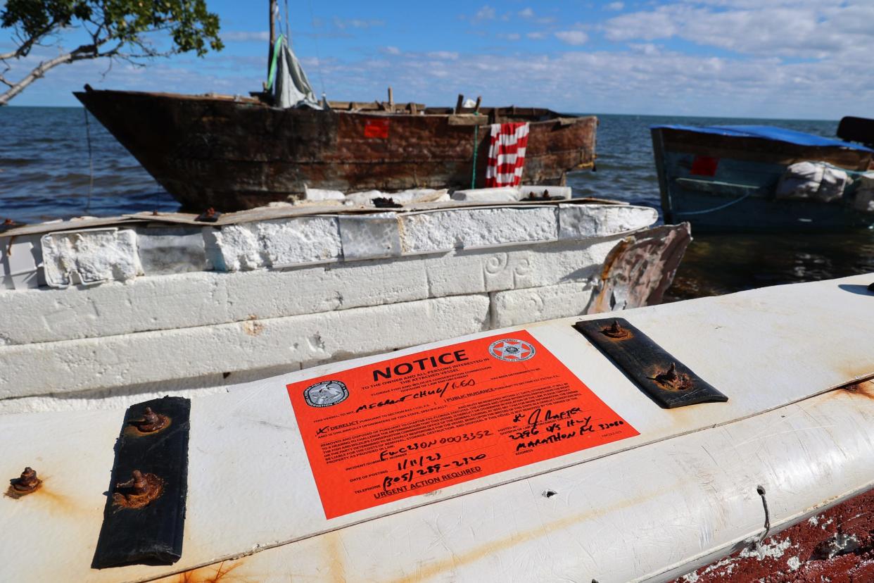 Abandoned migrant boats on the coastline of the Florida Keys.