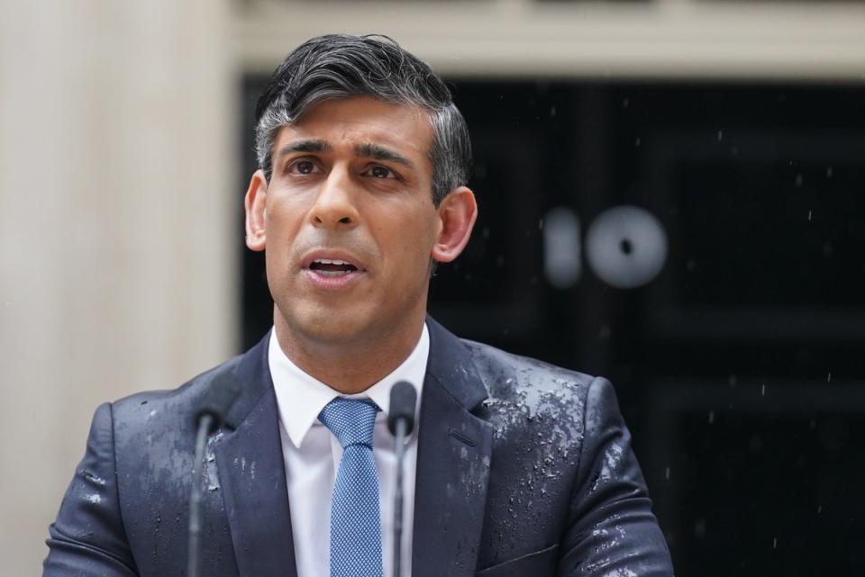 How it began: Rishi Sunak calls the election in the middle of a rain storm on 22 May (PA Wire)