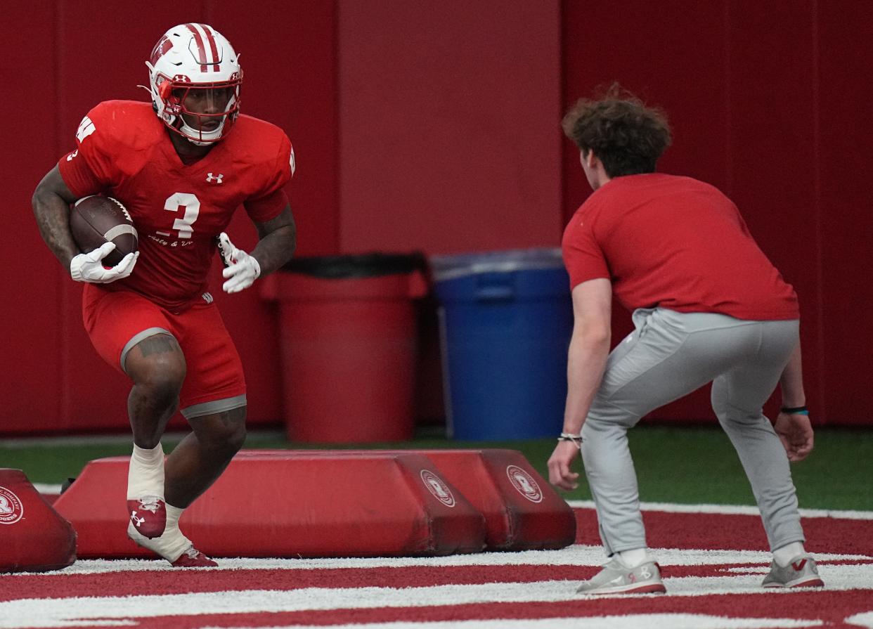 Running back Tawee Walker, a transfer from Oklahoma, has fit right in this spring according to offensive coordinator Phil Longo.
