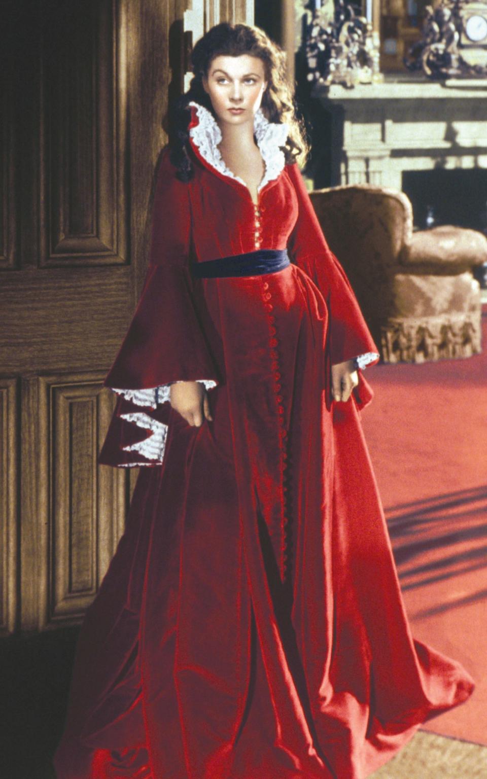 A red dress can evoke the femme fatale figure, referencing Scarlett O'Hara in Gone with the Wind...