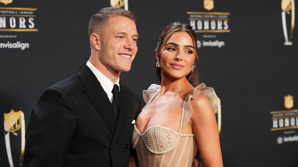 Christian McCaffrey and Olivia Culpo pose for a photo on the red carpet during NFL Honors at the Symphony Hall on February 9, 2023 in Phoenix, Arizona. (Cooper Neill / Getty Images)