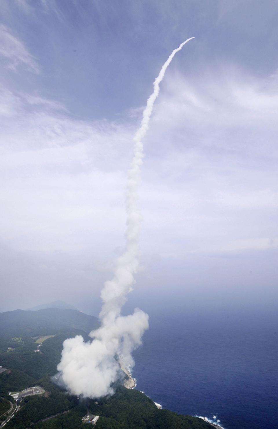 An Epsilon rocket blasts off into space from the launching pad at the Uchinoura Space Center in Kimotsuki town, Kagoshima prefecture