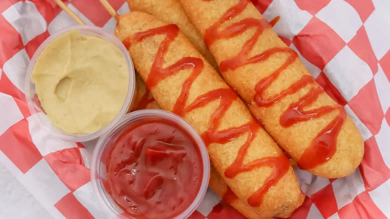 Corn dogs with ketchup