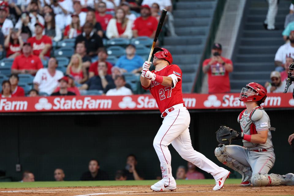 Aug 22, 2023; Anaheim, California, USA; Los Angeles Angels center fielder Mike Trout (27) pops out to second during the first inning against the Cincinnati Reds at Angel Stadium.