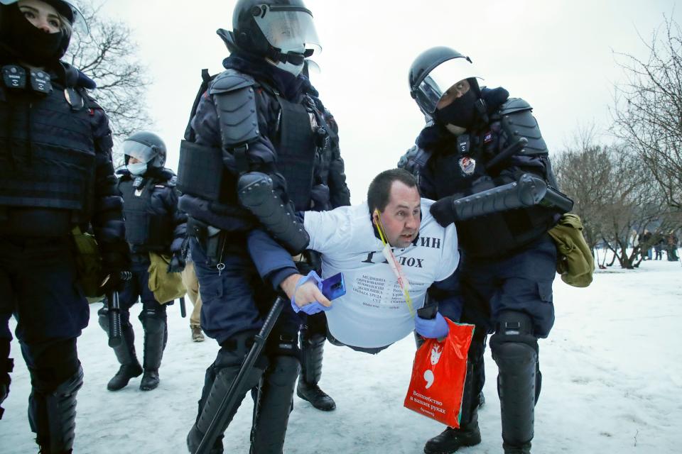 Police detain a man during a St. Petersburg protest against the jailing of opposition leader Alexei Navalny in this Jan. 23, 2021 photo.