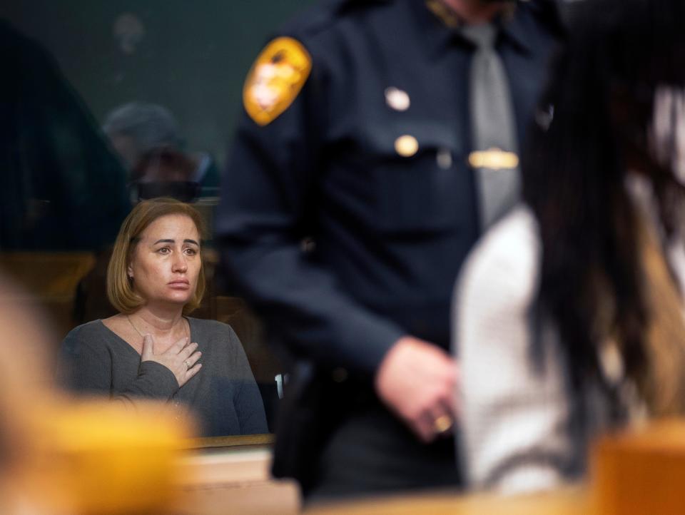 Felisha Zimmerman, reacts to seeing the man accused of killing her son, Kristopher Teeter, 17, Nov. 6, 2021. Joseph Bazel III, 24, was arrested Nov. 23, 2021 and charged with aggravated murder for the shooting. He was being arraigned in the Hamilton County Justice Center in downtown Cincinnati, November 24, 2021. The shooting happened at the BP food mart in South Fairmont. Brian (not shown) and Felisha Zimmerman lost a second son, Brian Crouse Jr., 18, to gun violence on July 25, 2017. 