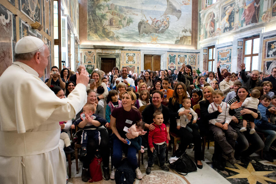 In this photo released by Vatican newspaper L'Osservatore Romano, Pope Francis delivers his blessing during a meeting with the Italian pro-life movement, at the Vatican Friday, April 11, 2014. (AP Photo/L'Osservatore Romano)