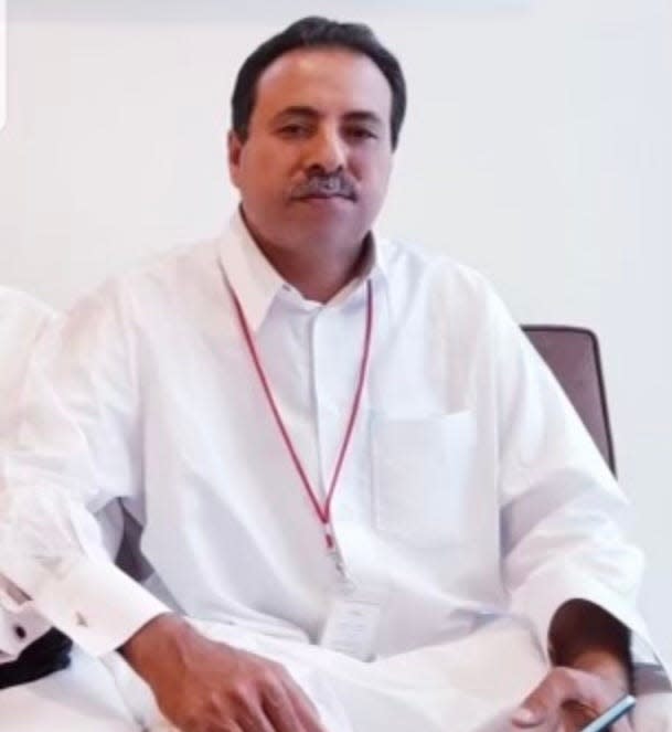 Mohamad Salem, 63, of Melvindale, dressed in white clothes often worn during religious pilgrimage to Saudi Arabia, is seen here a few weeks ago, before he was detained by authorities in Saudi Arabia, according to his attorney.