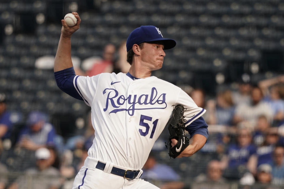 Kansas City Royals starting pitcher Brady Singer throws during the first inning in the second game of a baseball doubleheader against the Chicago White Sox Tuesday, May 17, 2022, in Kansas City, Mo. (AP Photo/Charlie Riedel)