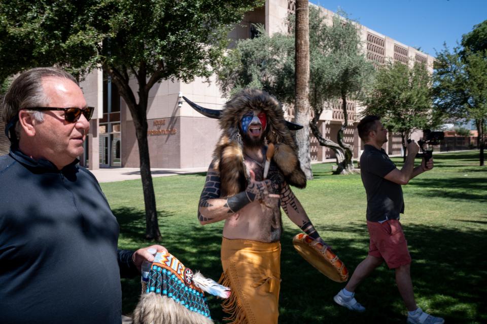 Jake Angeli, known as the QAnon Shaman, at the Arizona state Capital for a photo shoot, May 24, 2023, in Phoenix.