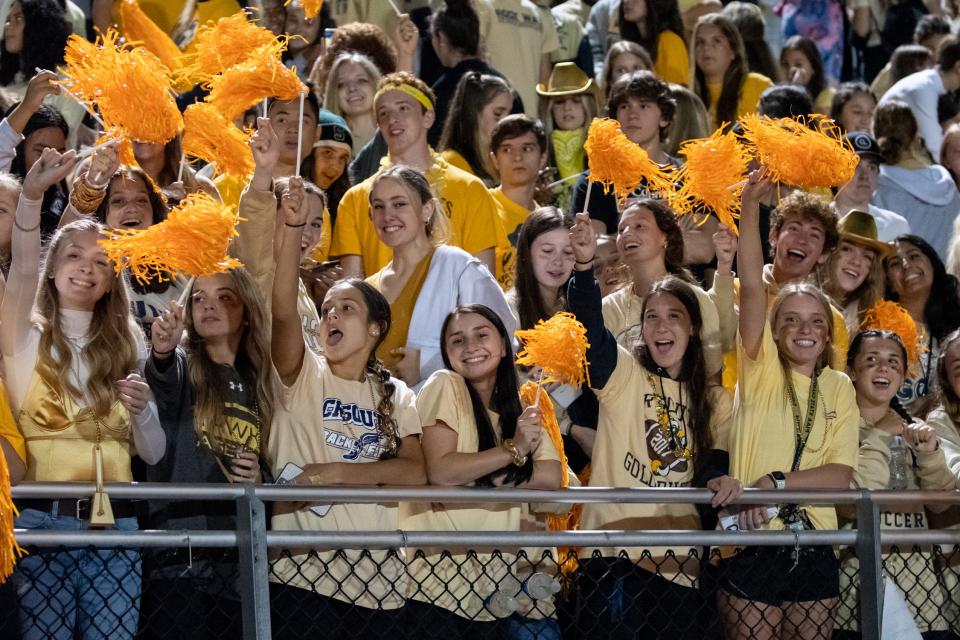 The Council Rock South student section celebrates from the stands during a football game against Central Bucks South, on Thursday, October 7, 2021, at Walt Snyder Stadium in Newtown Borough. The Titans defeated the Golden Hawks, 38-14.