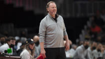 Milwaukee Bucks head coach Mike Budenholzer looks at the court during the first half of an NBA basketball game against the Atlanta Hawks, Monday, Jan. 17, 2022, in Atlanta. (AP Photo/Hakim Wright Sr.)