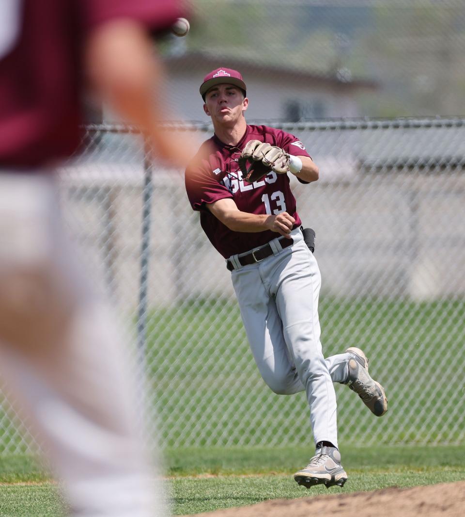 Maple Mountain’s Sawyer Leifson (13) throws to first against Orem during a 5A baseball super regional series in Orem on Friday, May 19, 2023. | Jeffrey D. Allred, Deseret News