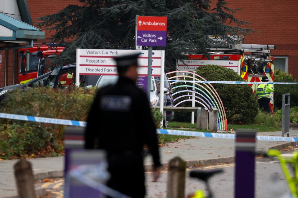 Police keep guard near the scene of a car blast at Liverpool Women's Hospital on Monday morning (Reuters)