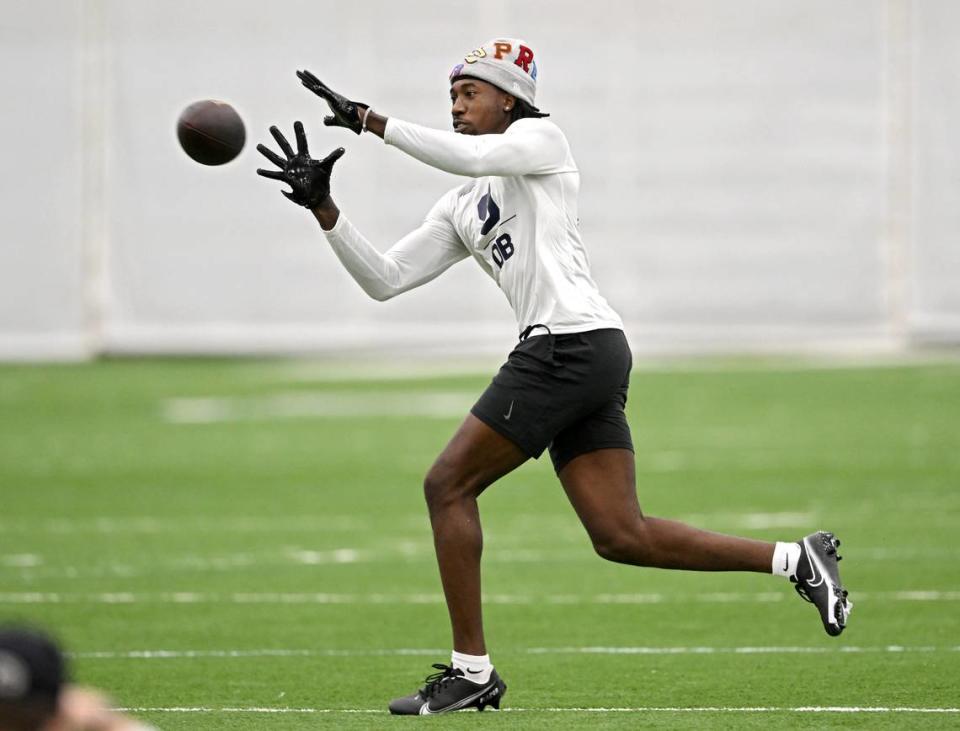 Cornerback Joey Porter Jr. makes a catch as he runs position drills during Penn State football’s Pro Day on Friday, March 24, 2023.