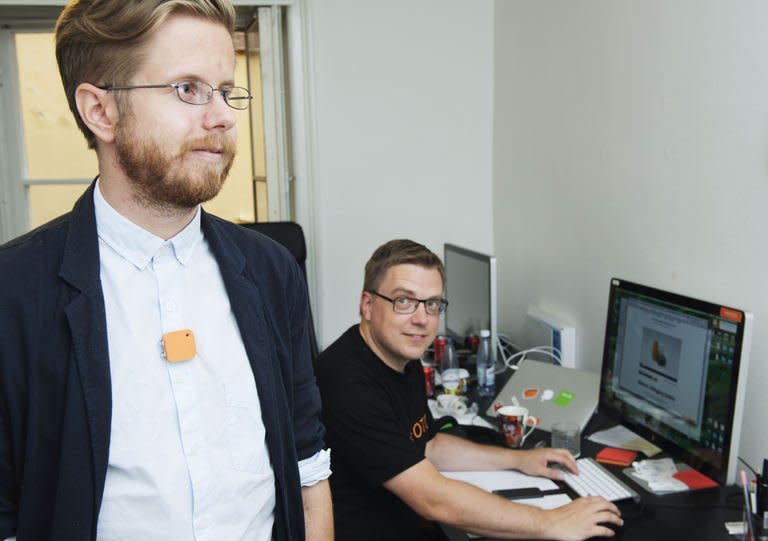 Co-founder and CEO of Swedish Memoto, Martin Kaellstroem (R), looks to one of the company's workers wearing the life-logging Memoto camera in Stockholm on August 29, 2013. Lifelogging does raise some privacy questions, says Steven Savage, a researcher at the Swedish Defence Research Agency, noting that the private sphere is relative: what is not offensive to one person might be to another