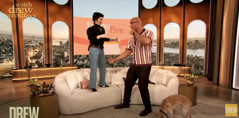 Drew Barrymore and Dwayne Johnson about to perform a stunt