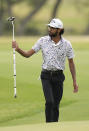Akshay Bhatia waves to the gallery as he walks to the 18th green during the third round of the Texas Open golf tournament, Saturday, April 6, 2024, in San Antonio. (AP Photo/Eric Gay)