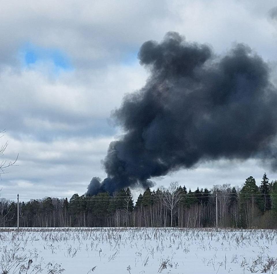 Smoke is seen billowing from the crash site