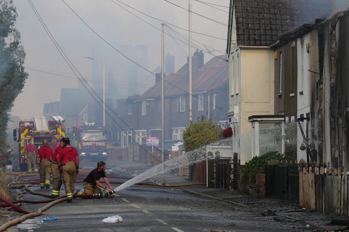 Fire crews fight a large fire which destroyed multiple homes in Wennington during the heatwave  (Getty Images)