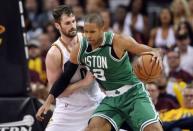 May 23, 2017; Cleveland, OH, USA; Cleveland Cavaliers forward Kevin Love (0) defends Boston Celtics center Al Horford (42) during the fourth quarter in game four of the Eastern conference finals of the NBA Playoffs at Quicken Loans Arena. Mandatory Credit: Ken Blaze-USA TODAY Sports