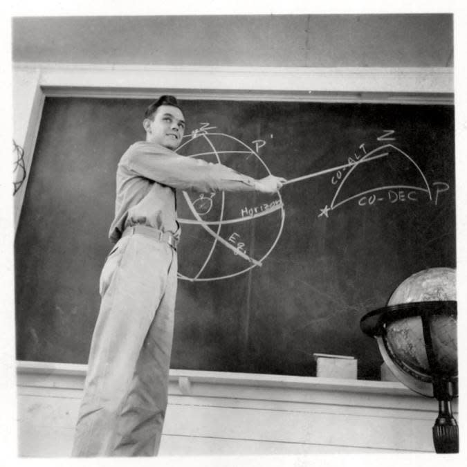 A photograph of Captain Carroll Sears Rankin teaching flight navigation during WWII as it originally appeared in an edition of Life Magazine.